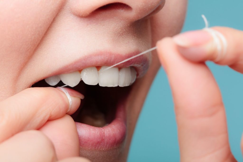 floss your teeth properly Clinton North Carolina